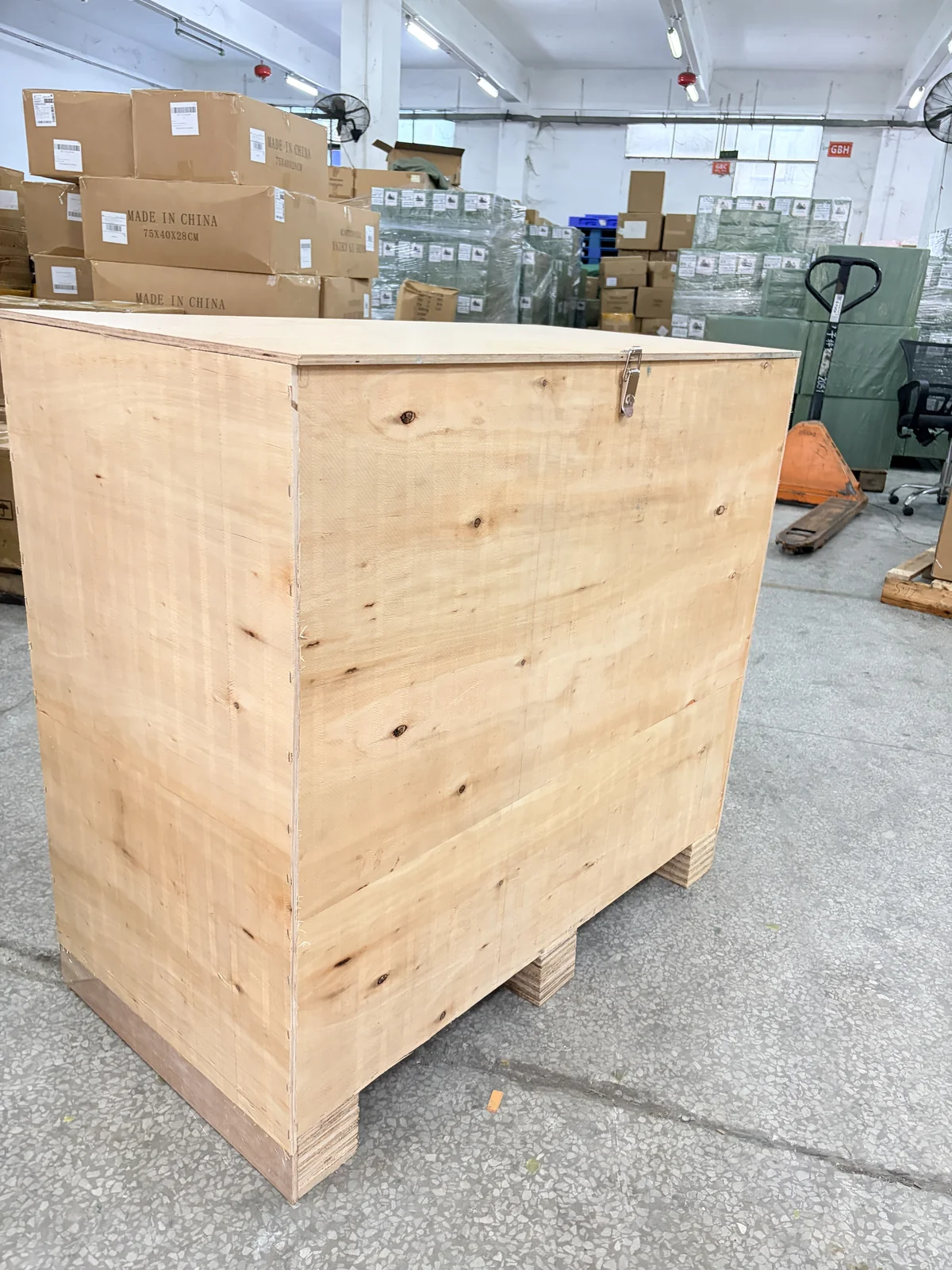Multiple heavy-duty export wooden crates palletized for international logistics